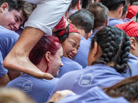 Members of Colla Jove Xiquets de Tarragona build a human tower during the Concurs de Castells competition in Tarragona, Spain, on October 6,...