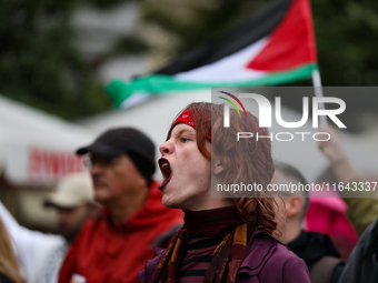 Participants in a pro-Palestinian protest gather on the Main Square and then proceed to the US Consulate and the Jagiellonian University in...