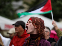 Participants in a pro-Palestinian protest gather on the Main Square and then proceed to the US Consulate and the Jagiellonian University in...