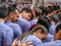 Members of Colla Jove Xiquets de Tarragona build a human tower during the Concurs de Castells competition in Tarragona, Spain, on October 6,...