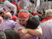 Members of Colla Jove Xiquets de Tarragona celebrate the victory after building a human tower during the Concurs de Castells competition in...