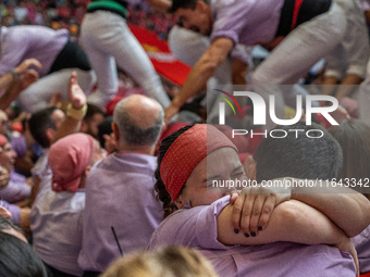 Members of Colla Jove Xiquets de Tarragona celebrate the victory after building a human tower during the Concurs de Castells competition in...