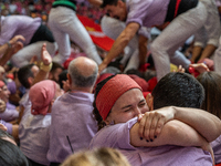 Members of Colla Jove Xiquets de Tarragona celebrate the victory after building a human tower during the Concurs de Castells competition in...