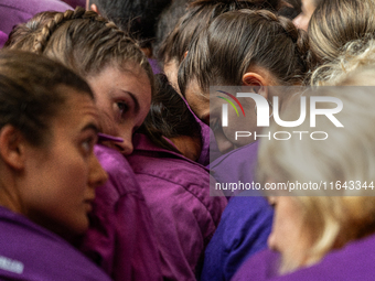 Members of Moixiganguers d'Igualada build a human tower during the Concurs de Castells competition in Tarragona, Spain, on October 6, 2024....