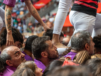 Members of Moixiganguers d'Igualada build a human tower during the Concurs de Castells competition in Tarragona, Spain, on October 6, 2024....