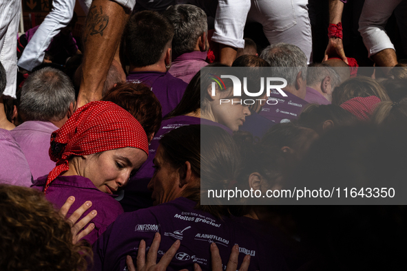 Members of the colla Moixiganguers d'Igualada build a human tower during the Concurs de Castells competition in Tarragona, Spain, on October...