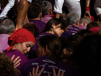 Members of the colla Moixiganguers d'Igualada build a human tower during the Concurs de Castells competition in Tarragona, Spain, on October...