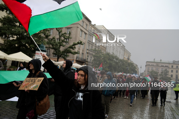 Participants in a pro-Palestinian protest gather on the Main Square and then proceed to the US Consulate and the Jagiellonian University in...