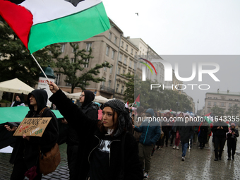 Participants in a pro-Palestinian protest gather on the Main Square and then proceed to the US Consulate and the Jagiellonian University in...