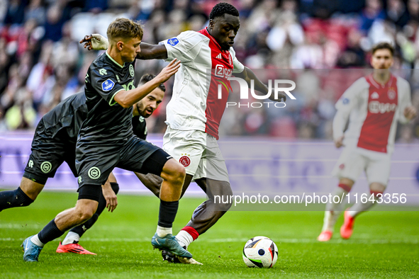 FC Groningen midfielder Luciano Valente and AFC Ajax Amsterdam forward Brian Brobbey play during the match between Ajax and Groningen at the...