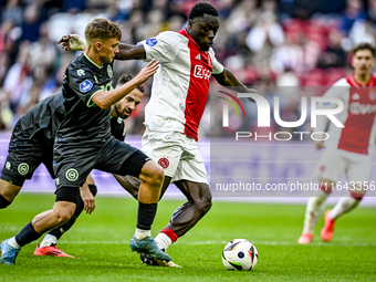 FC Groningen midfielder Luciano Valente and AFC Ajax Amsterdam forward Brian Brobbey play during the match between Ajax and Groningen at the...