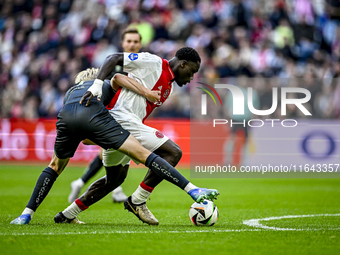 AFC Ajax Amsterdam forward Brian Brobbey plays during the match between Ajax and Groningen at the Johan Cruijff ArenA for the Dutch Eredivis...