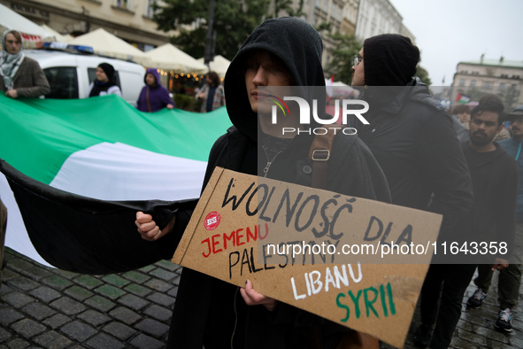 Participants in a pro-Palestinian protest gather on the Main Square and then proceed to the US Consulate and the Jagiellonian University in...