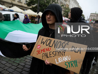 Participants in a pro-Palestinian protest gather on the Main Square and then proceed to the US Consulate and the Jagiellonian University in...