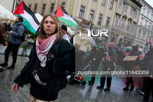 Participants in a pro-Palestinian protest gather on the Main Square and then proceed to the US Consulate and the Jagiellonian University in...