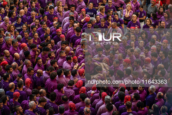 Members of Moixiganguers d'Igualada build a human tower during the Concurs de Castells competition in Tarragona, Spain, on October 6, 2024. 