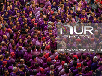 Members of Moixiganguers d'Igualada build a human tower during the Concurs de Castells competition in Tarragona, Spain, on October 6, 2024....