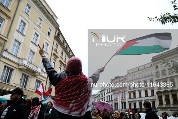 Participants in a pro-Palestinian protest gather on the Main Square and then proceed to the US Consulate and the Jagiellonian University in...