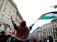 Participants in a pro-Palestinian protest gather on the Main Square and then proceed to the US Consulate and the Jagiellonian University in...