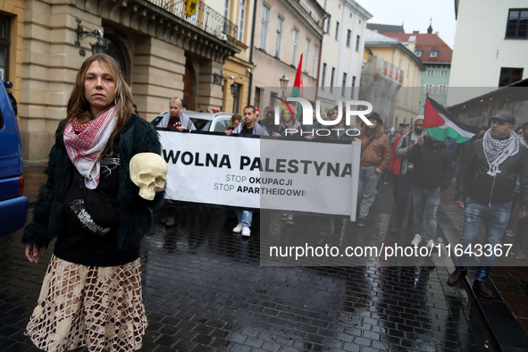 Participants in a pro-Palestinian protest gather on the Main Square and then proceed to the US Consulate and the Jagiellonian University in...