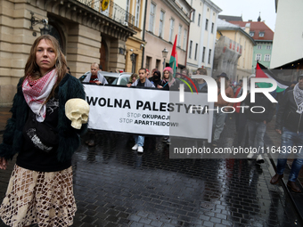 Participants in a pro-Palestinian protest gather on the Main Square and then proceed to the US Consulate and the Jagiellonian University in...