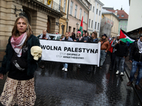 Participants in a pro-Palestinian protest gather on the Main Square and then proceed to the US Consulate and the Jagiellonian University in...