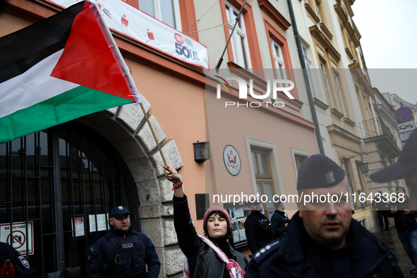 Participants in a pro-Palestinian protest gather on the Main Square and then proceed to the US Consulate and the Jagiellonian University in...