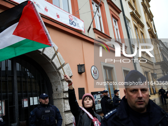 Participants in a pro-Palestinian protest gather on the Main Square and then proceed to the US Consulate and the Jagiellonian University in...