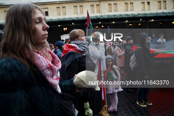 Participants in a pro-Palestinian protest gather on the Main Square and then proceed to the US Consulate and the Jagiellonian University in...