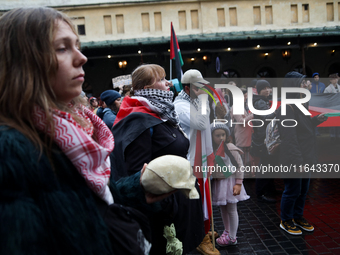 Participants in a pro-Palestinian protest gather on the Main Square and then proceed to the US Consulate and the Jagiellonian University in...