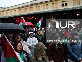 Participants in a pro-Palestinian protest gather on the Main Square and then proceed to the US Consulate and the Jagiellonian University in...