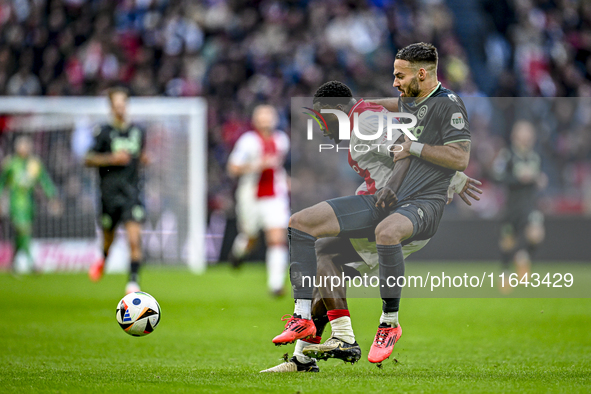 AFC Ajax Amsterdam forward Brian Brobbey and FC Groningen defender Marco Rente play during the match between Ajax and Groningen at the Johan...