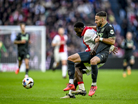 AFC Ajax Amsterdam forward Brian Brobbey and FC Groningen defender Marco Rente play during the match between Ajax and Groningen at the Johan...