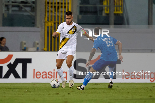 Sean Gatt (left) of Zabbar St. Patrick is in action during the Malta 360 Sports Premier League soccer match between Zabbar St. Patrick and M...