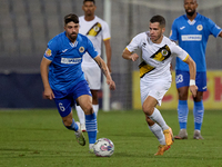 Stefan Ilic of Zabbar St. Patrick moves with the ball while Nikolai Muscat of Marsaxlokk closely attends during the Malta 360 Sports Premier...