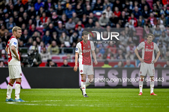 AFC Ajax Amsterdam midfielder Branco van den Boomen and AFC Ajax Amsterdam forward Mika Godts are disappointed after the goal by FC Groninge...