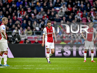 AFC Ajax Amsterdam midfielder Branco van den Boomen and AFC Ajax Amsterdam forward Mika Godts are disappointed after the goal by FC Groninge...