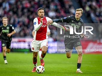 AFC Ajax Amsterdam defender Devyne Rensch and FC Groningen defender Finn Stam play during the match between Ajax and Groningen at the Johan...