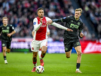 AFC Ajax Amsterdam defender Devyne Rensch and FC Groningen defender Finn Stam play during the match between Ajax and Groningen at the Johan...