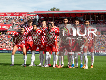 In Girona, Spain, on October 6, 2024, Girona FC players form during the LaLiga EA Sports match between Girona FC and Athletic Club de Bilbao...