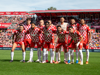 In Girona, Spain, on October 6, 2024, Girona FC players form during the LaLiga EA Sports match between Girona FC and Athletic Club de Bilbao...