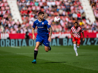 Oihan Sancet of Athletic Club de Bilbao is in action during the LaLiga EA Sports match between Girona FC and Athletic Club de Bilbao at Mont...