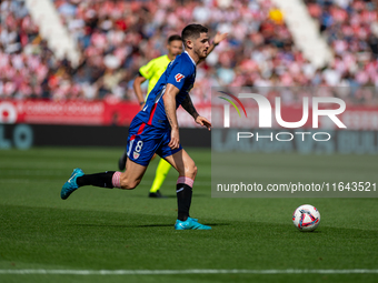 Players are in action during the LaLiga EA Sports match between Girona FC and Athletic Club de Bilbao at Montilivi Stadium in Girona, Spain,...