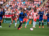 Alex Berenguer of Athletic Club de Bilbao is in action during the LaLiga EA Sports match between Girona FC and Athletic Club de Bilbao at Mo...