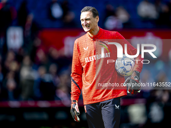 FC Twente goalkeeper Przemyslaw Tyton plays during the match between Feyenoord and Twente at the Feyenoord stadium De Kuip for the Dutch Ere...