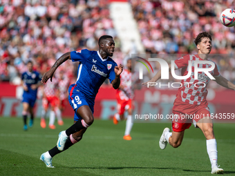 Inaki Williams of Athletic Club de Bilbao and Ladislav Krejci of Girona FC are in action during the LaLiga EA Sports match between Girona FC...