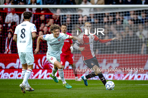 FC Twente forward Sam Lammers and Feyenoord Rotterdam defender Thomas Beelen play during the match between Feyenoord and Twente at the Feyen...