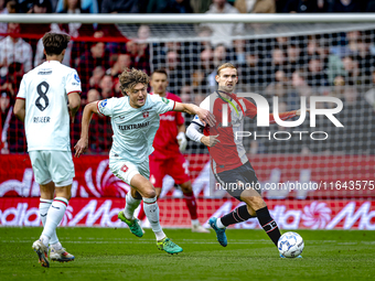 FC Twente forward Sam Lammers and Feyenoord Rotterdam defender Thomas Beelen play during the match between Feyenoord and Twente at the Feyen...