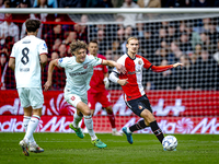 FC Twente forward Sam Lammers and Feyenoord Rotterdam defender Thomas Beelen play during the match between Feyenoord and Twente at the Feyen...