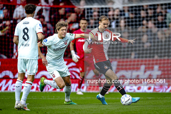 FC Twente forward Sam Lammers and Feyenoord Rotterdam defender Thomas Beelen play during the match between Feyenoord and Twente at the Feyen...